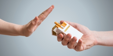 Quitting,Smoking,Concept.,Hand,Is,Refusing,Cigarette,Offer.