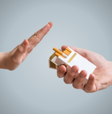 Quitting,Smoking,Concept.,Hand,Is,Refusing,Cigarette,Offer.