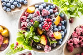 Frozen,Fruits,Blueberries,Blackberry,Raspberry,Red,Currant,Peach,And,Herbs