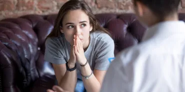 Young,Woman,Visiting,Therapist,Counselor.,Girl,Feeling,Depressed,,Unhappy,And