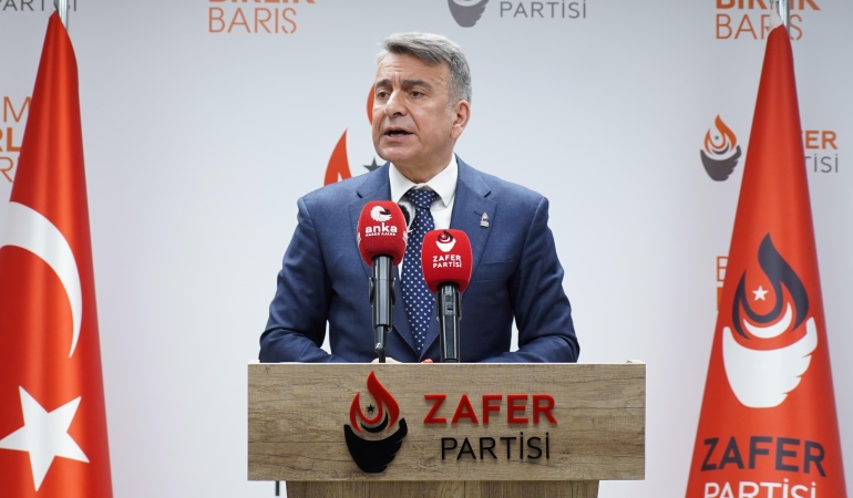 azmi karamahmutoglu_